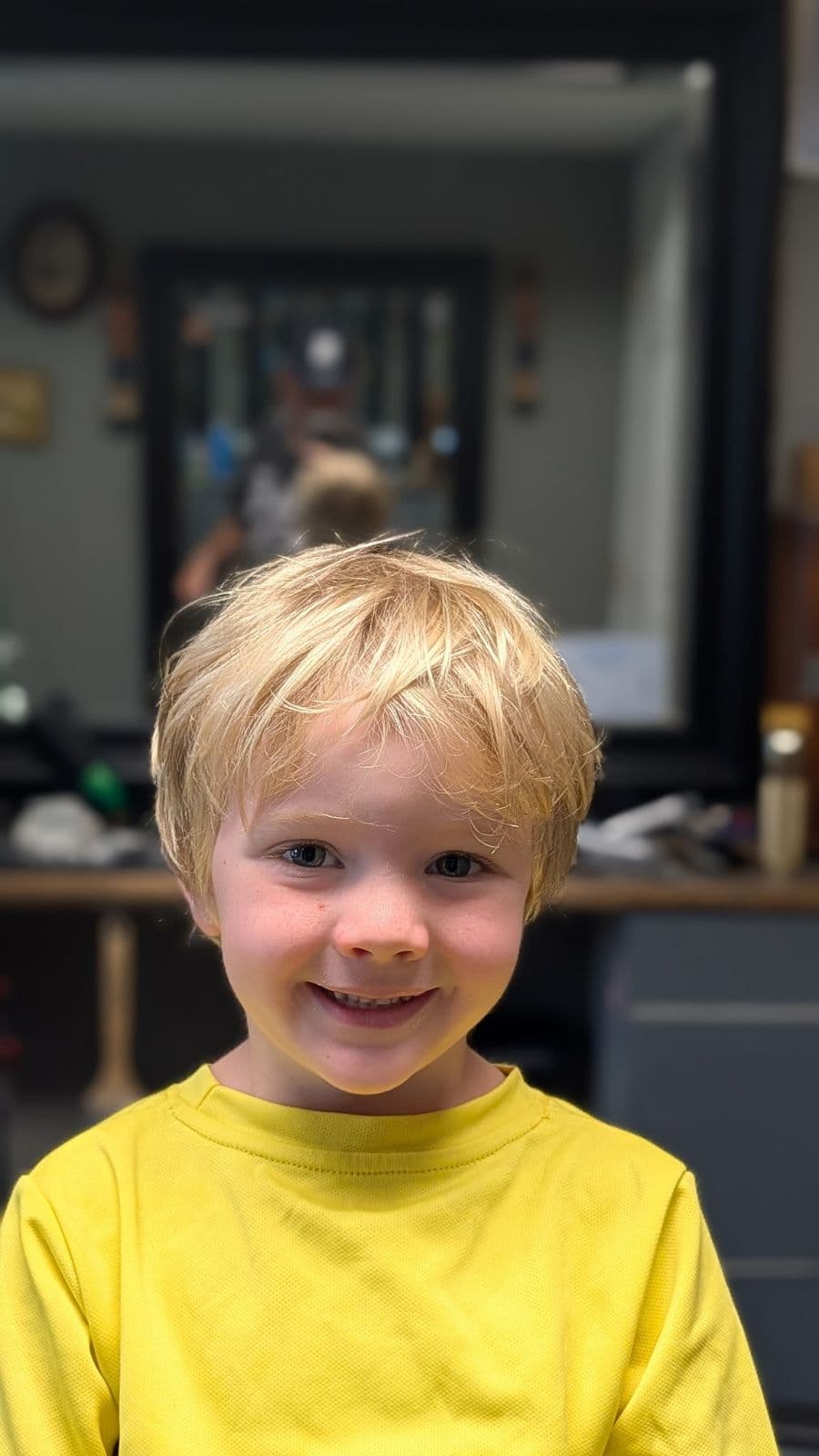 Young client with a tousled haircut at Gary's Barber Shop